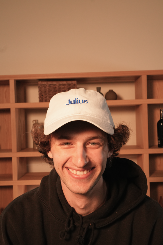 Julius White Hat Blue Julius Logo