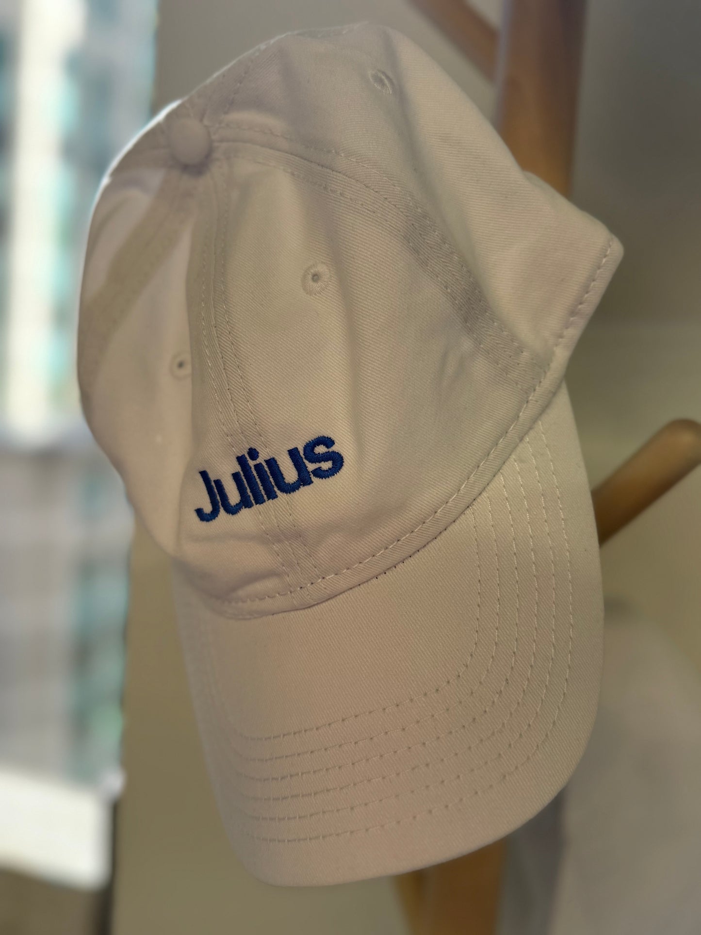 Julius White Hat Blue Julius Logo